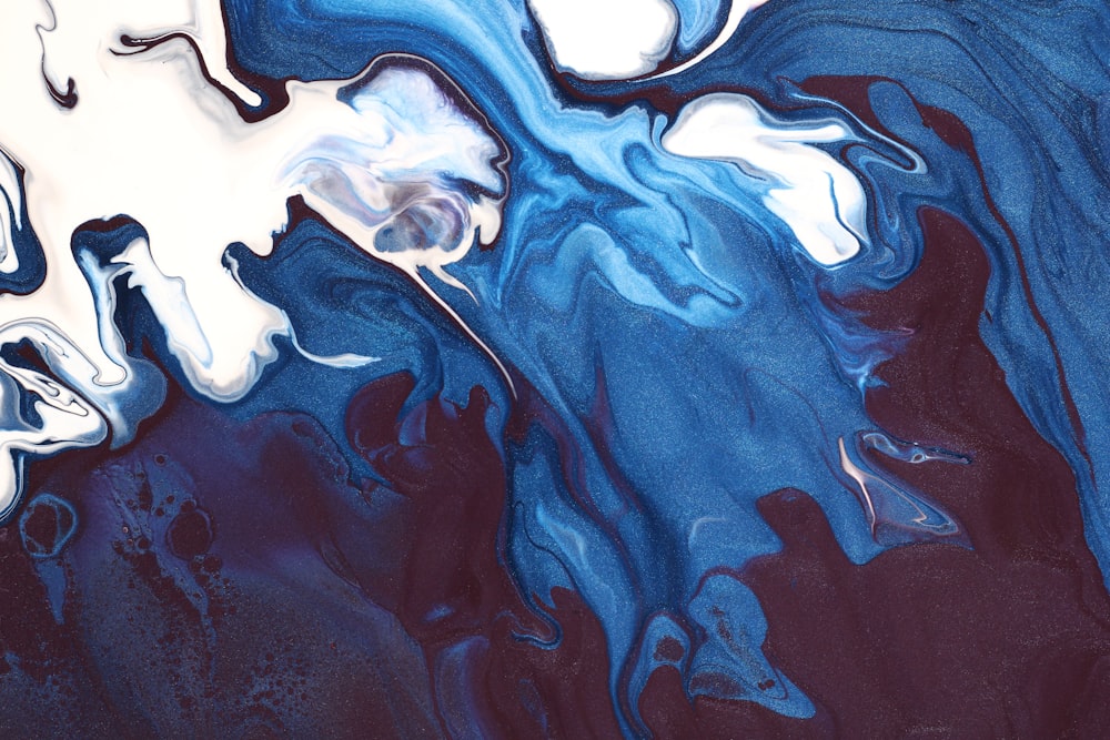 an abstract painting of blue and white colors