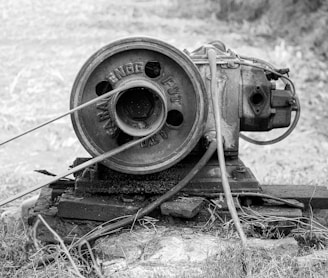 a black and white photo of an old movie projector