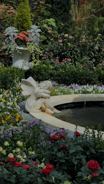 A quiet garden where nature spirits seem to linger among the flowers.