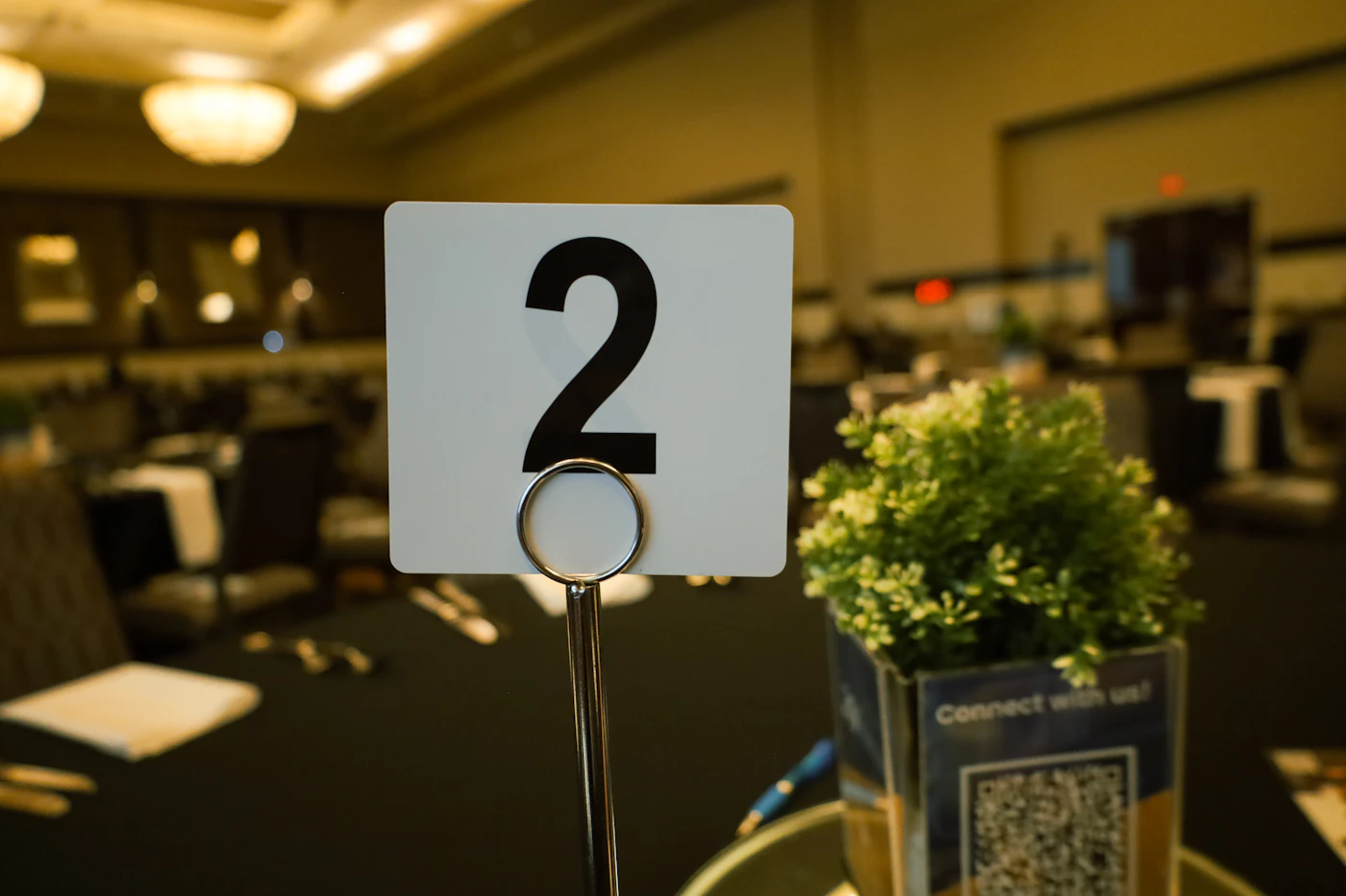 How to create a wedding seating chart board — A beautifully designed seating chart board at a wedding reception.