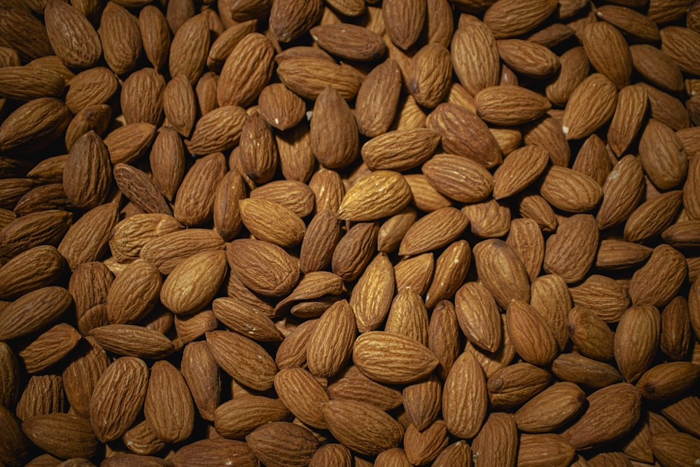 a pile of almonds sitting on top of a table