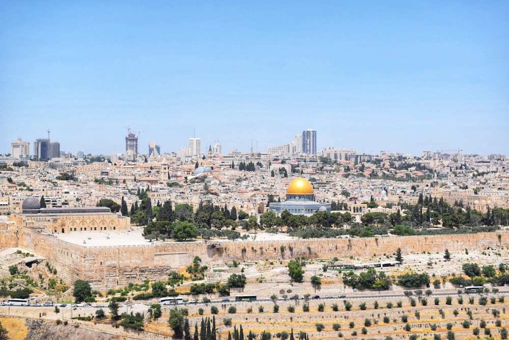 a view of a city with a dome in the middle