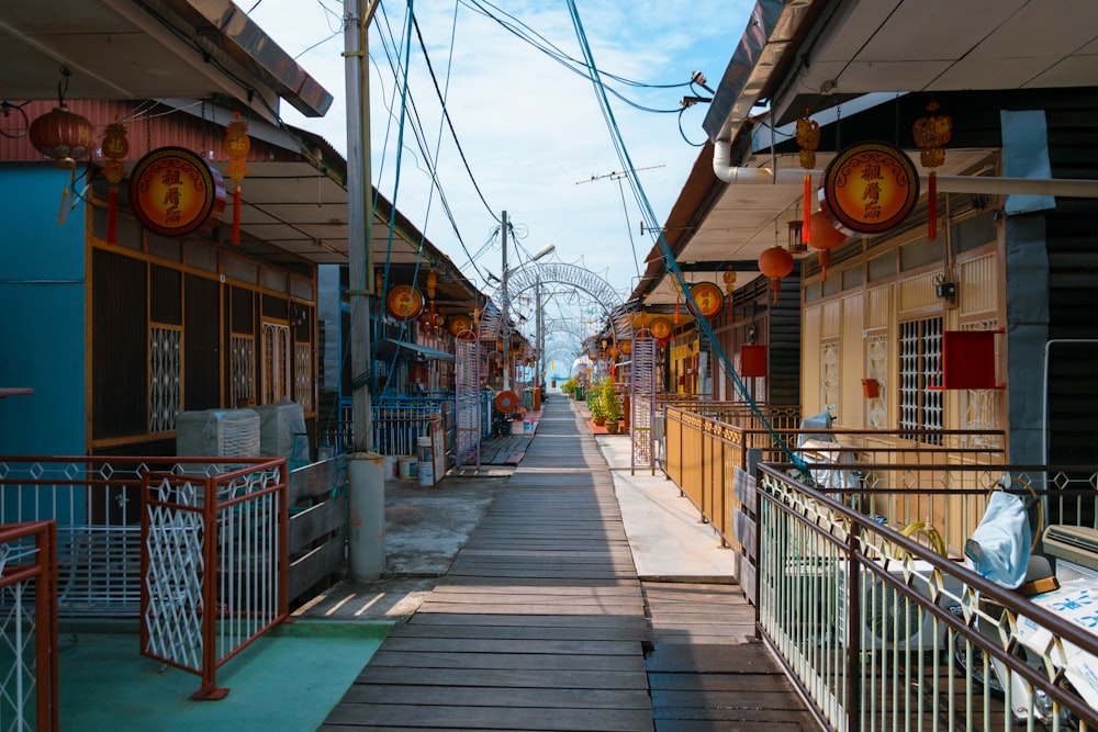 a narrow street lined with lots of buildings