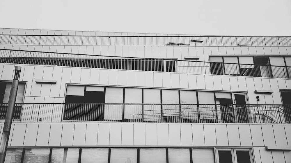 a black and white photo of an apartment building