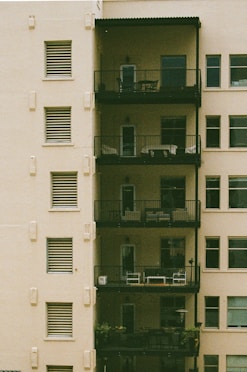 an apartment building with balconies and balconies on the balconies