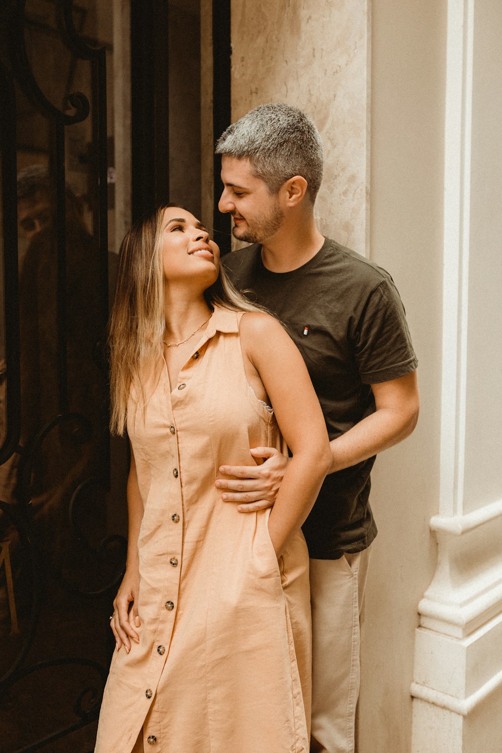 a man and a woman standing next to each other