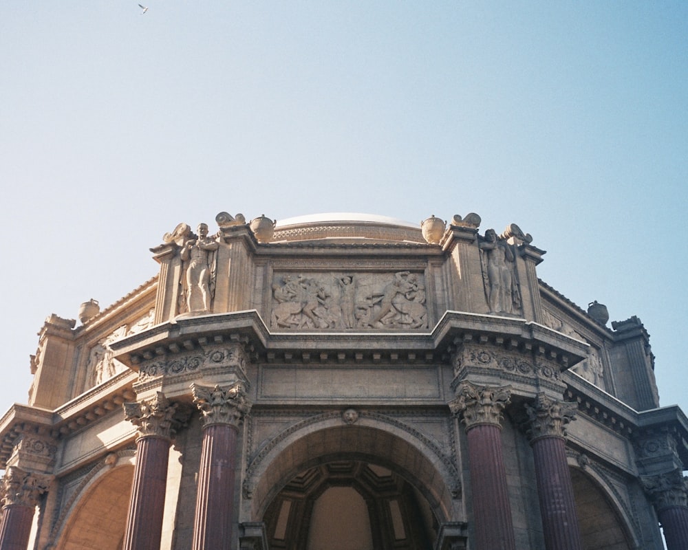 a large building with a clock on the front of it