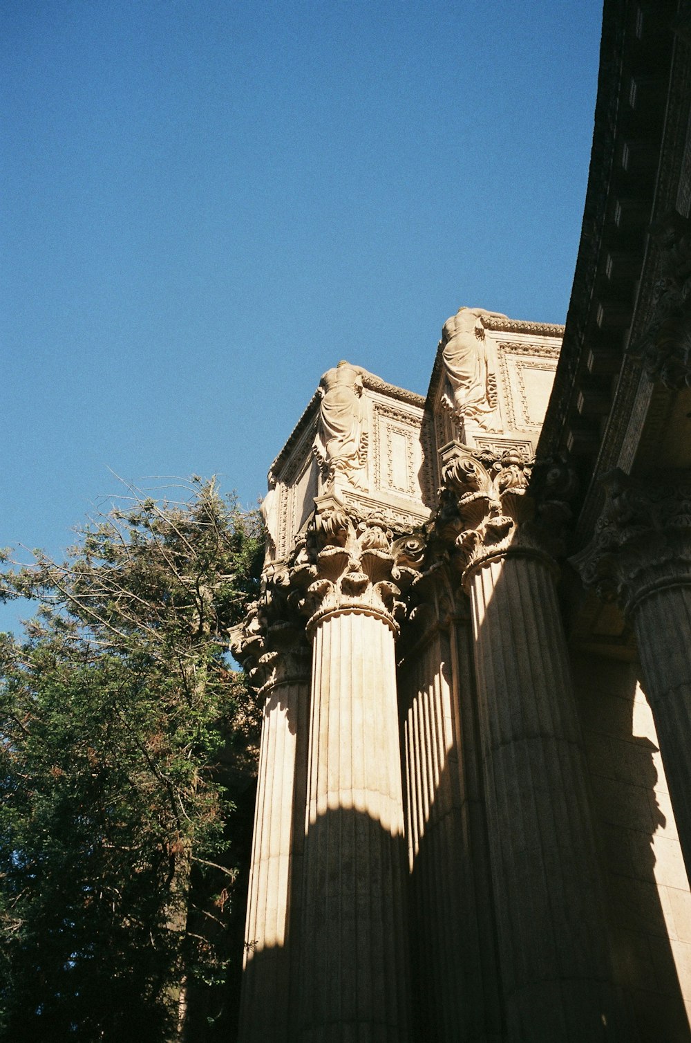 a view of the top of a building from below