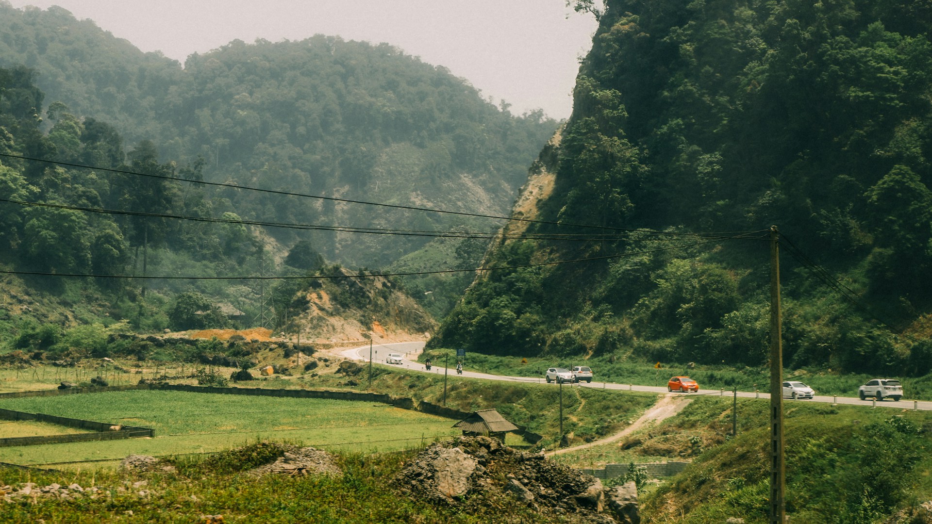 woman wearing yellow long-sleeved dress under white clouds and blue sky during daytime