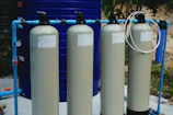 a couple of water tanks sitting next to each other