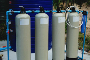 a couple of water tanks sitting next to each other