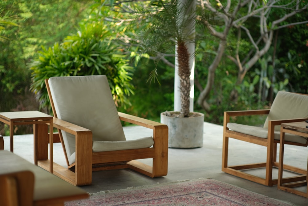 a couple of chairs sitting on top of a patio