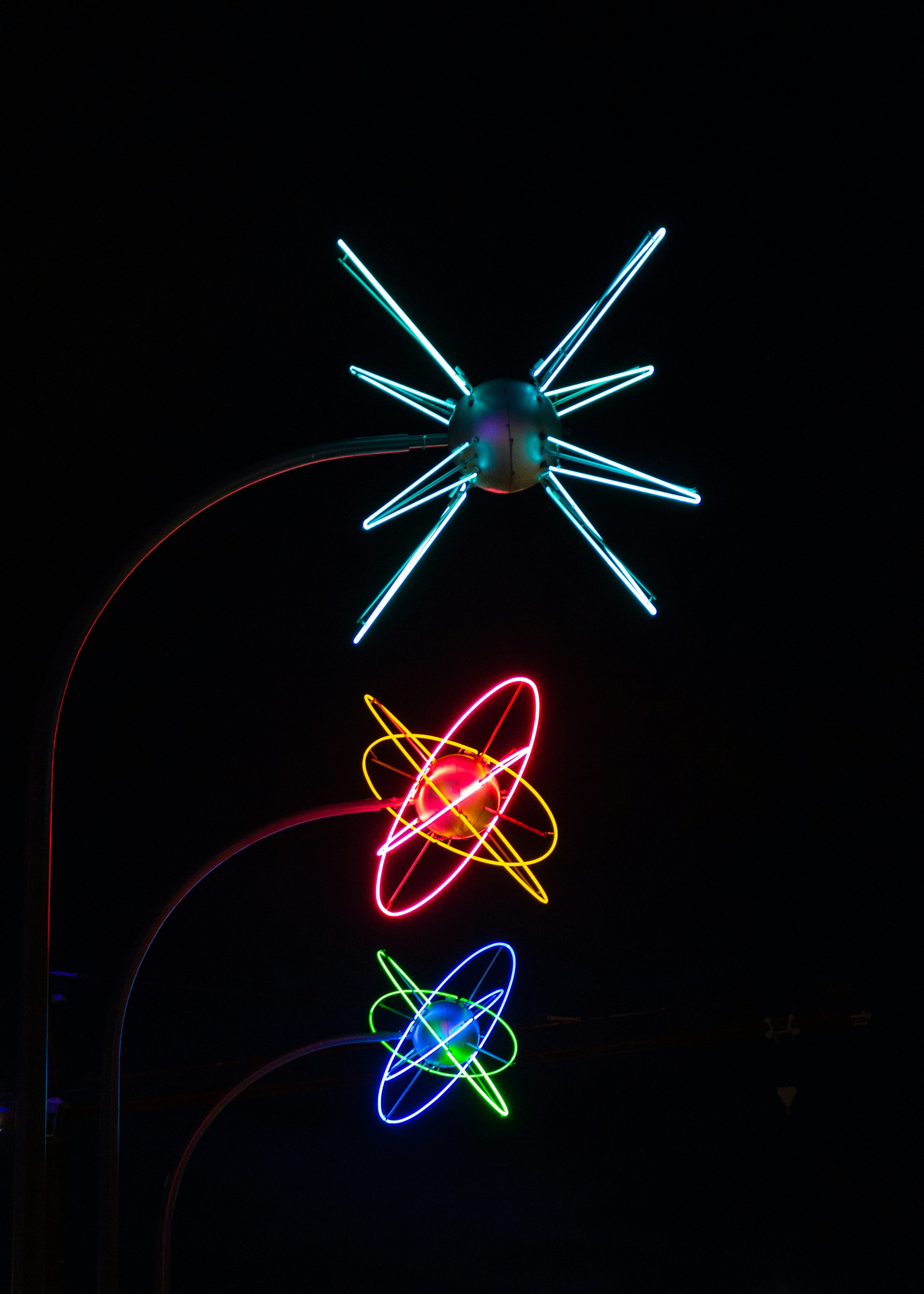 a clock tower lit up in the dark