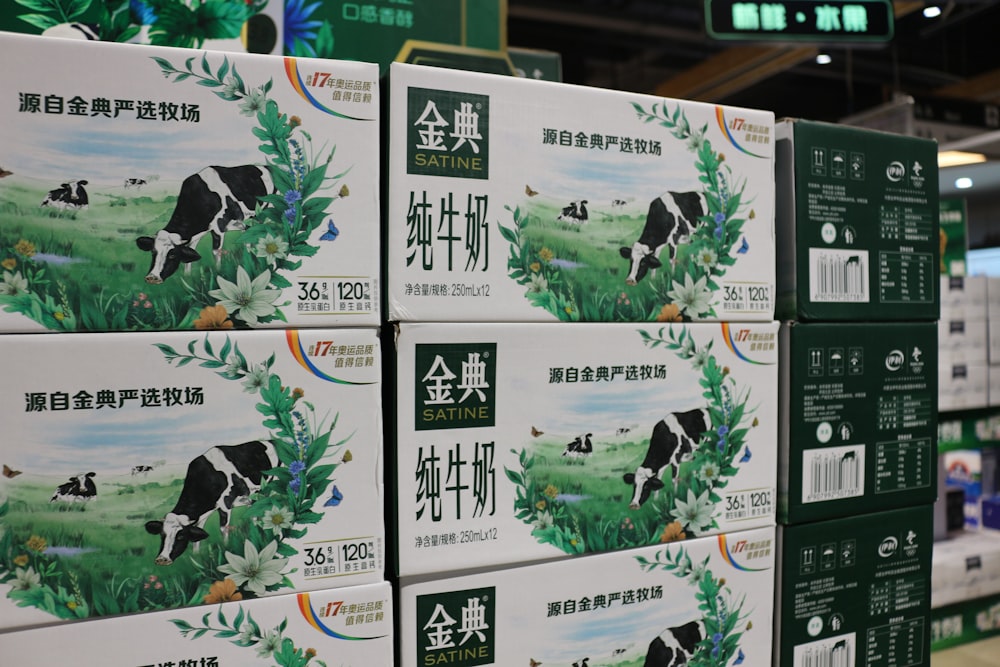 several boxes of milk are stacked on a shelf