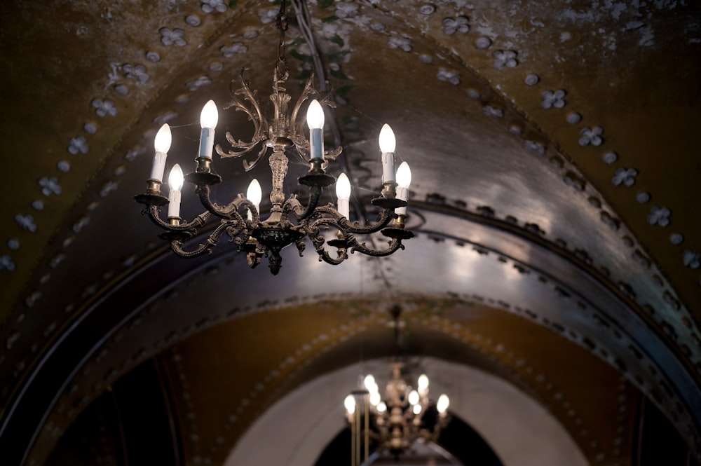 a chandelier hanging from the ceiling of a building