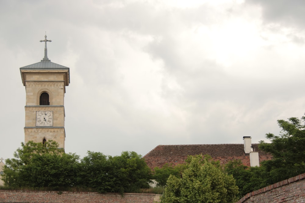 a tall clock tower towering over a city