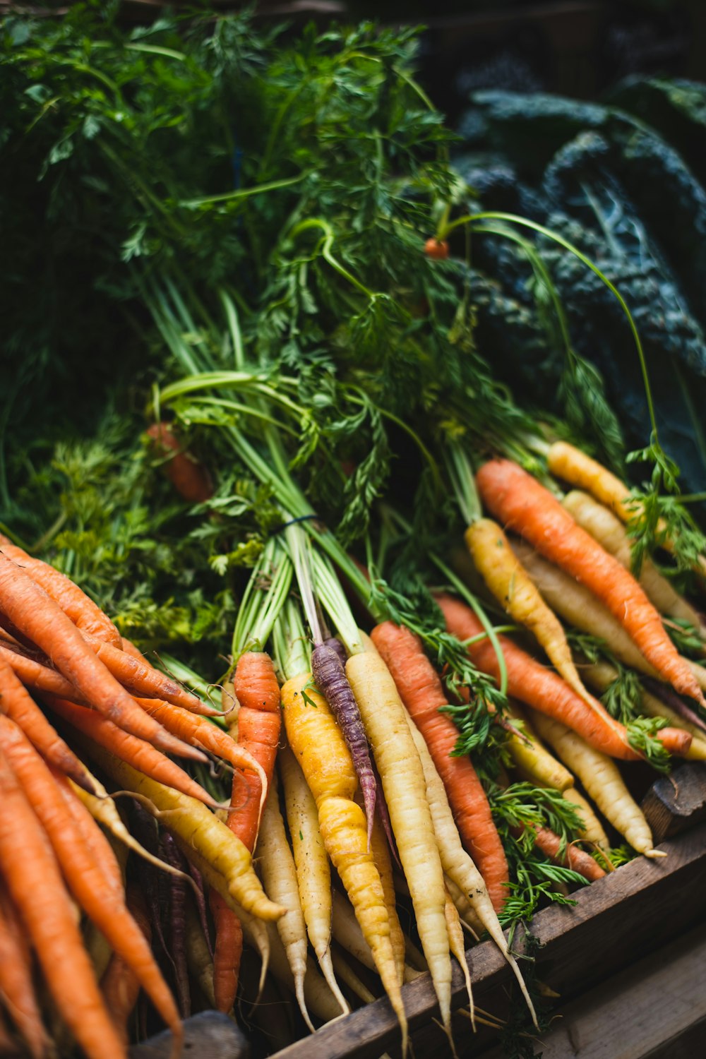 a bunch of carrots that are on a table