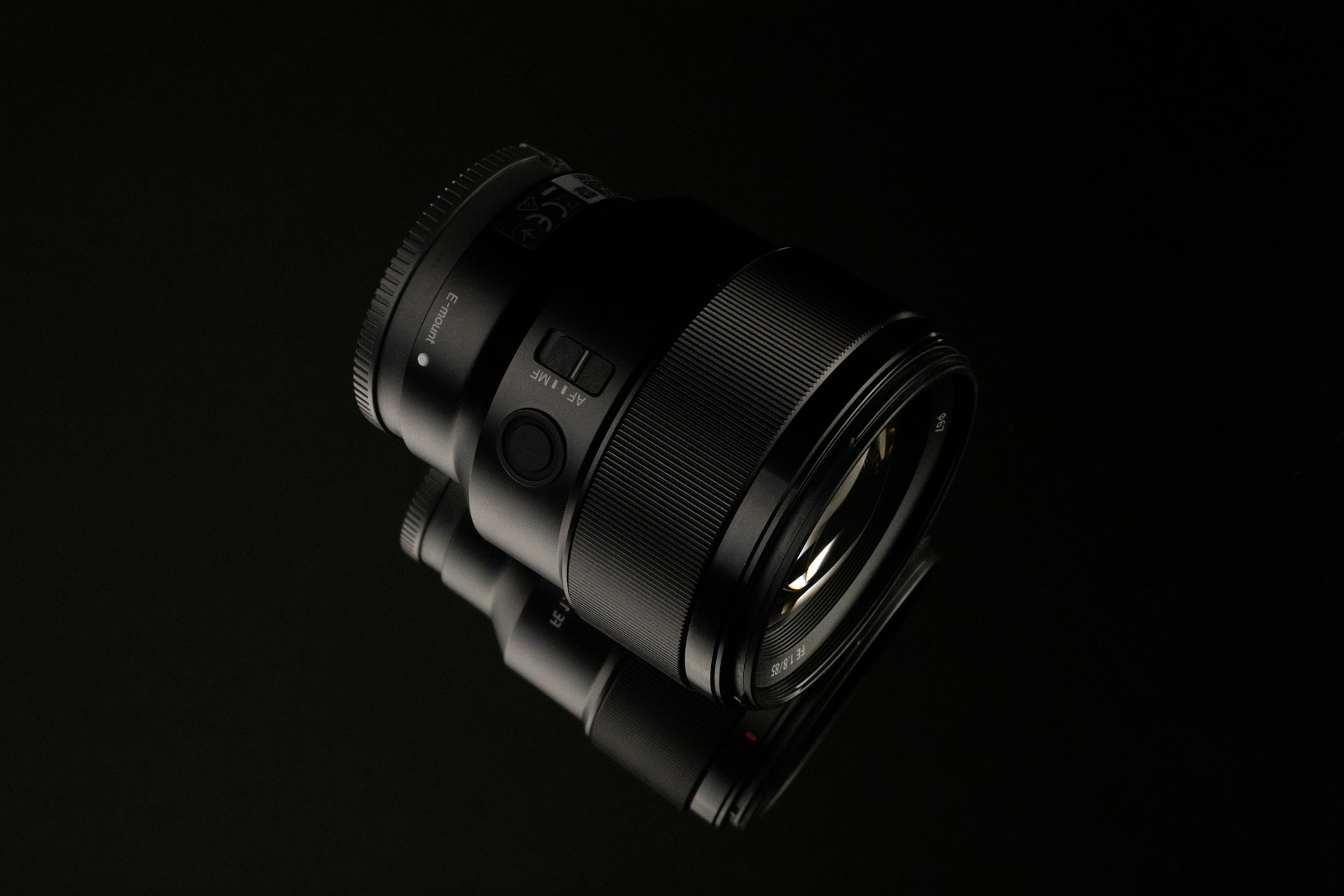 a close up of a camera lens on a black background