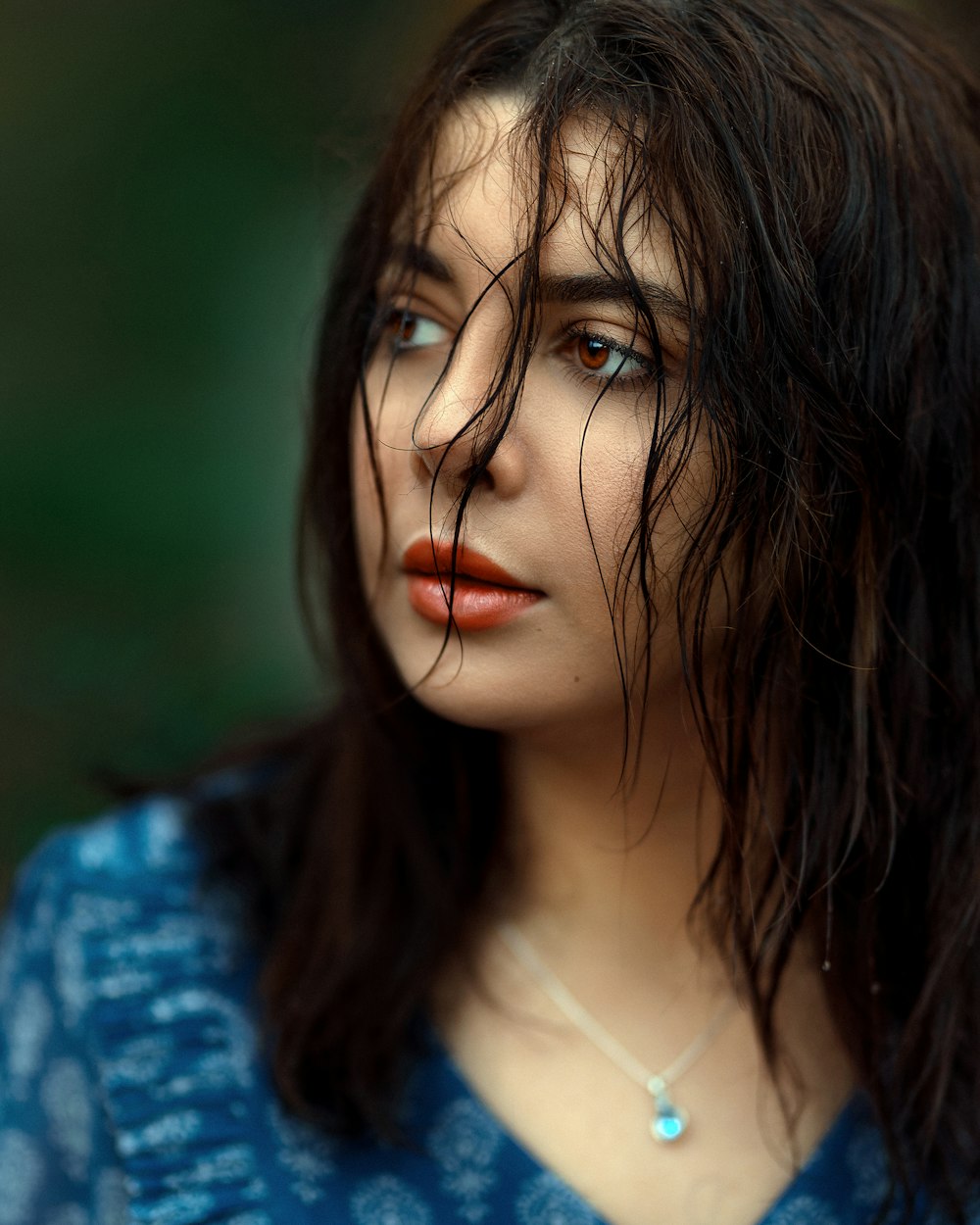 a close up of a person with long hair