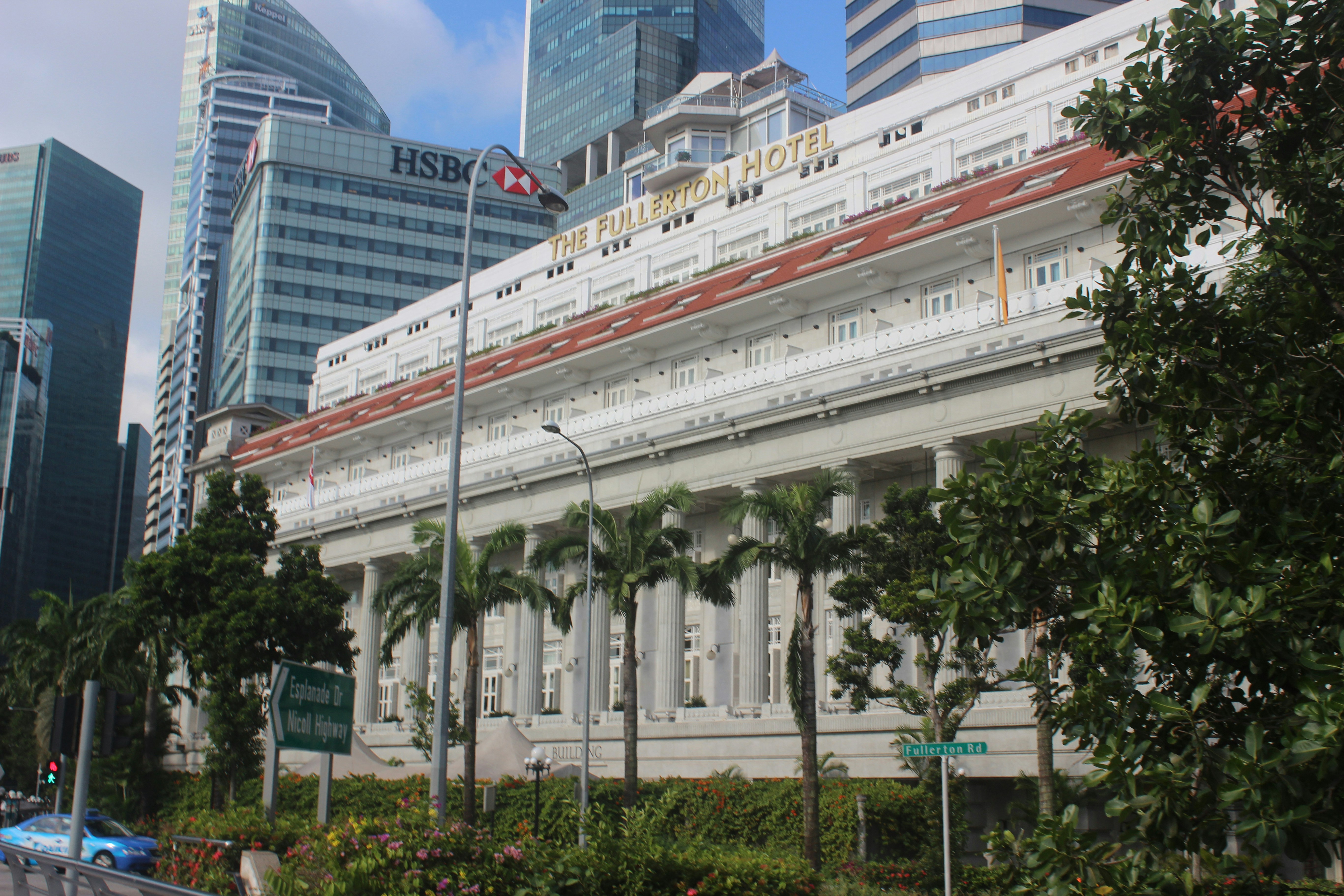 a train on a train track in a city