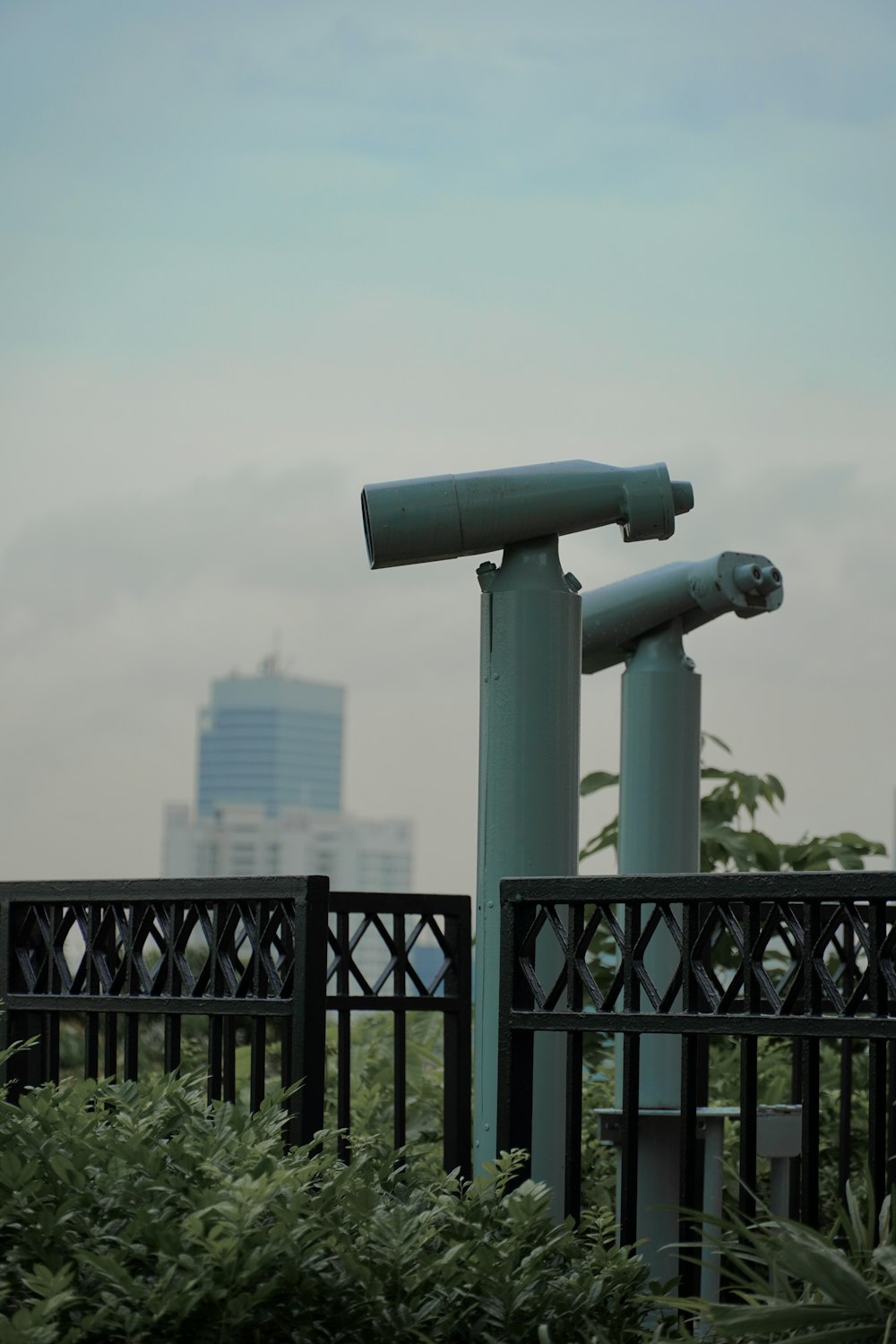 a large metal object sitting on top of a metal pole