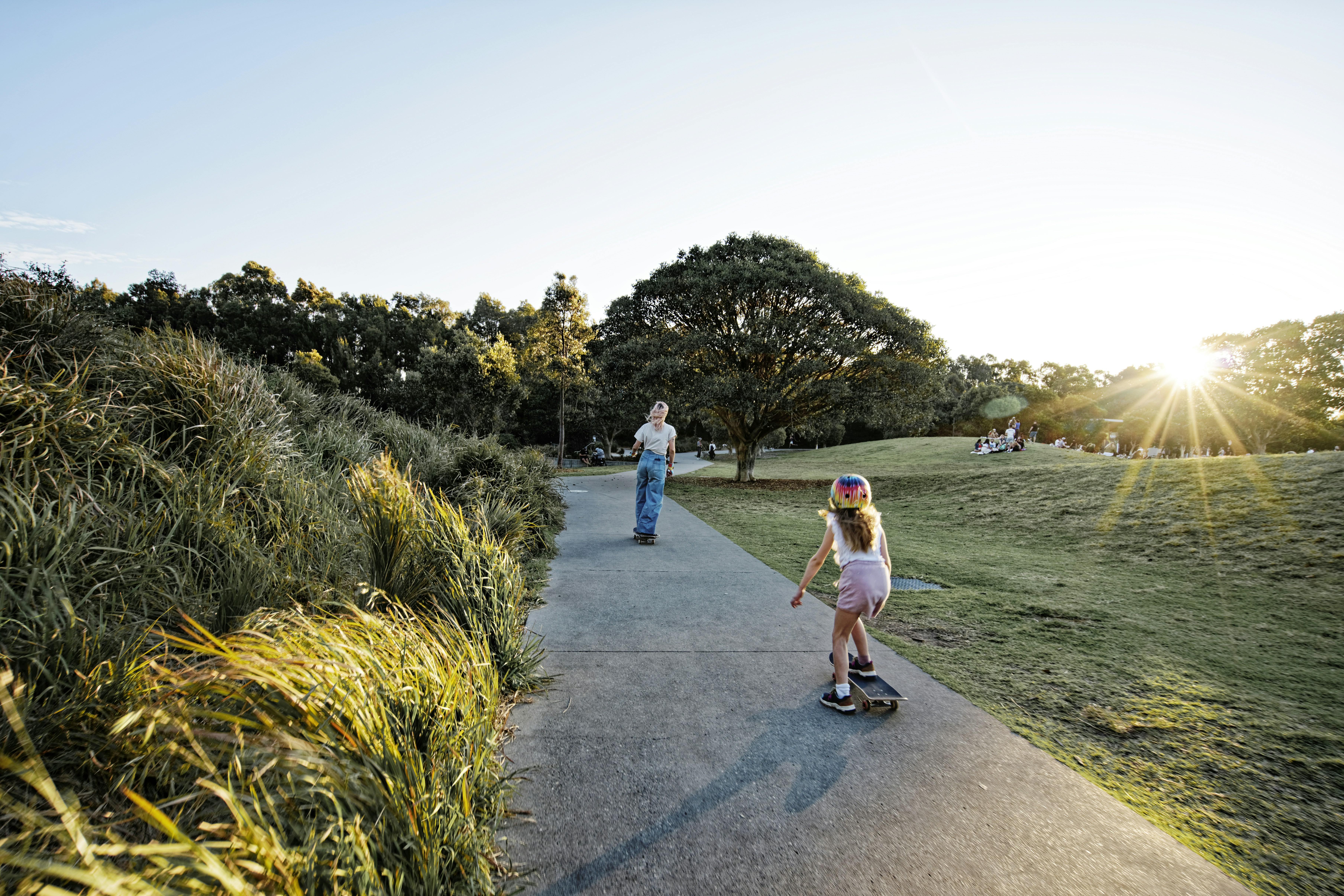 young people enjoying outdoor group activity together smiling mental health