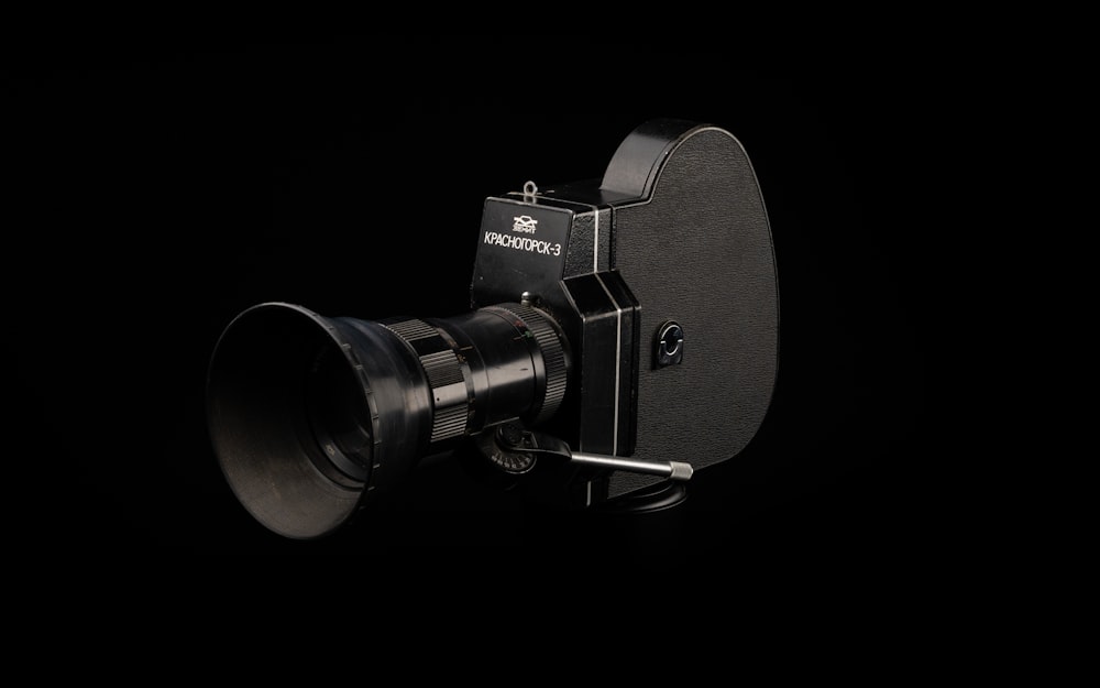 a camera on a black background with a black background