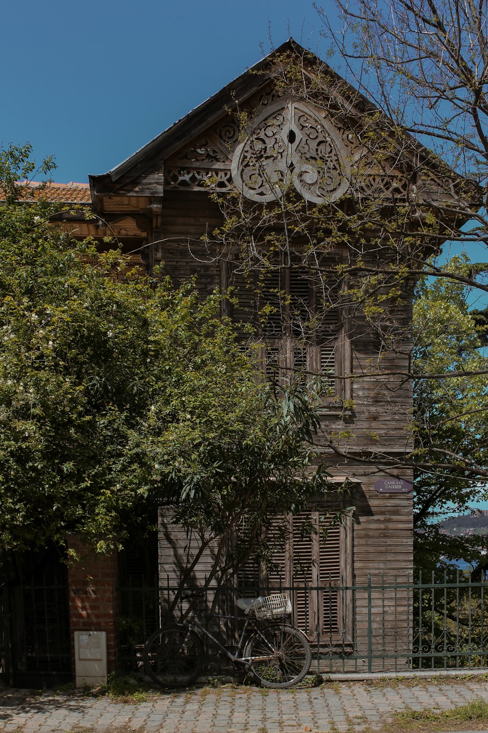 an old building with a clock on the side of it