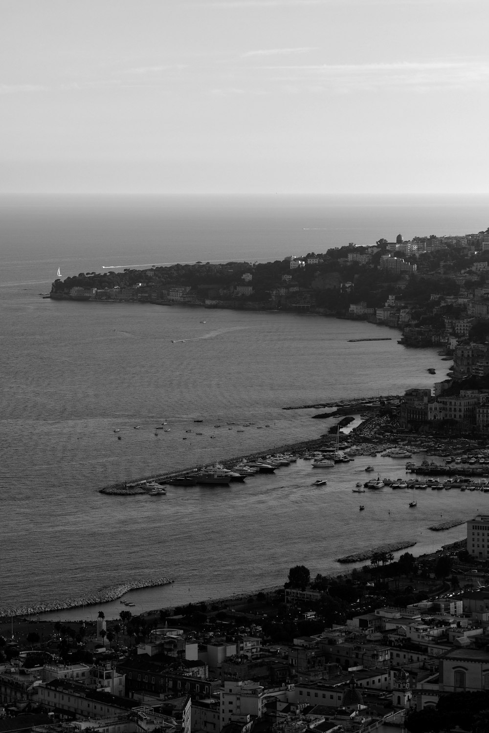 a black and white photo of a large body of water