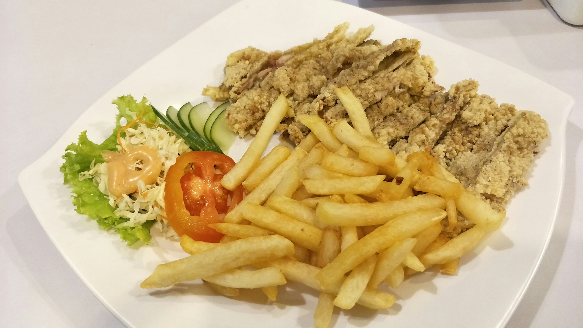woman wearing yellow long-sleeved dress under white clouds and blue sky during daytime