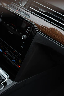 a car dashboard with a radio in the center of it