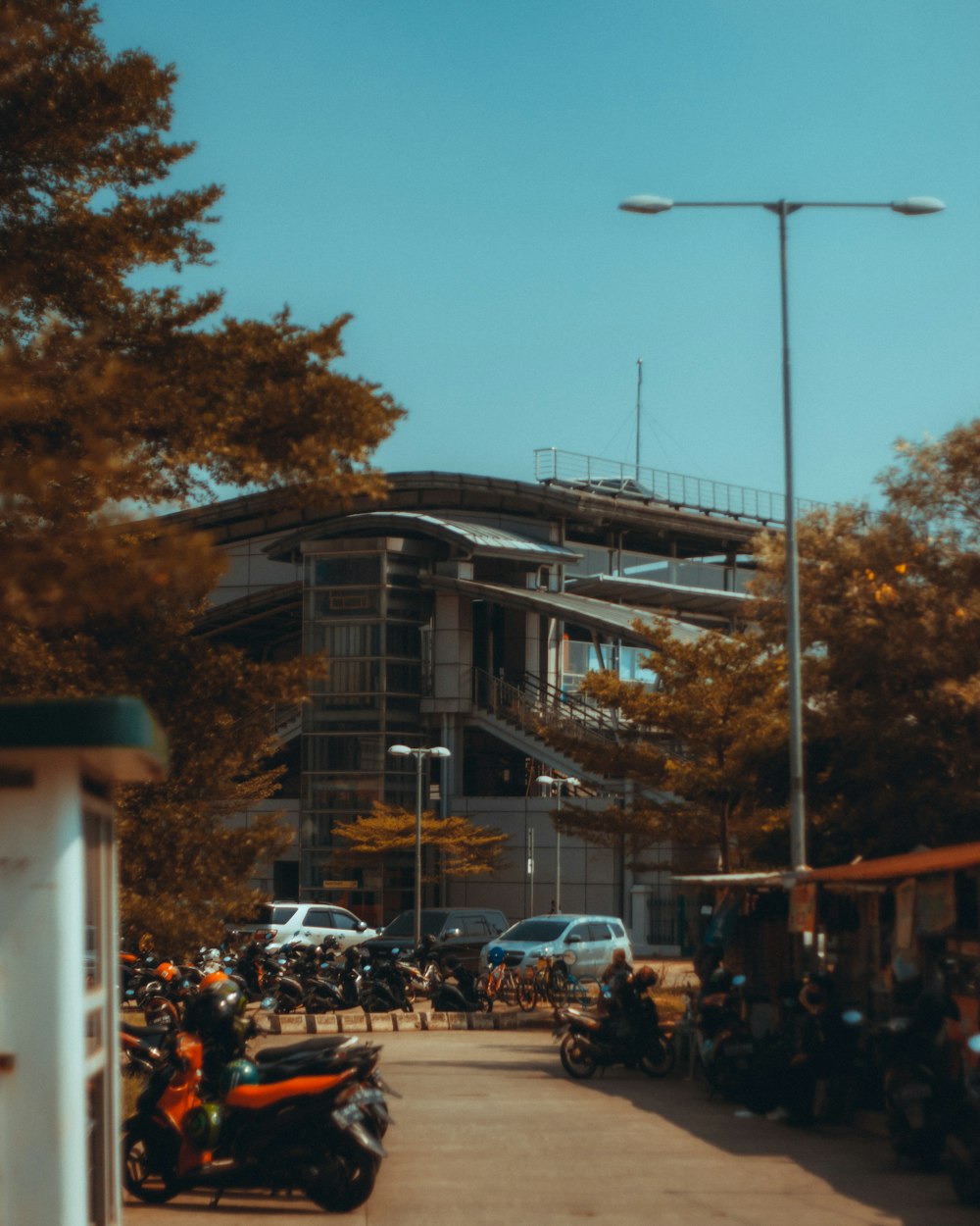 a group of motorcycles parked in front of a building