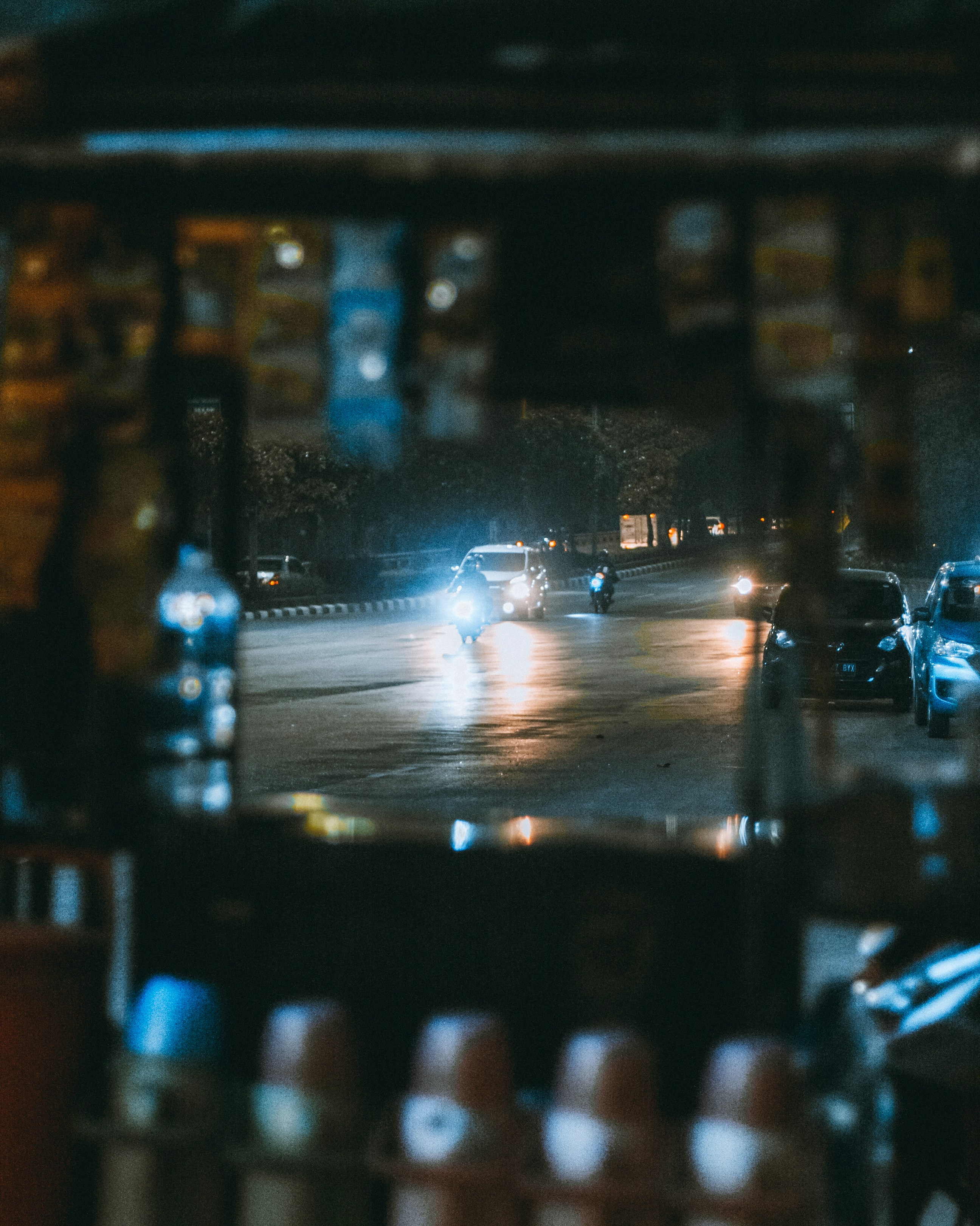 a blurry photo of a street at night