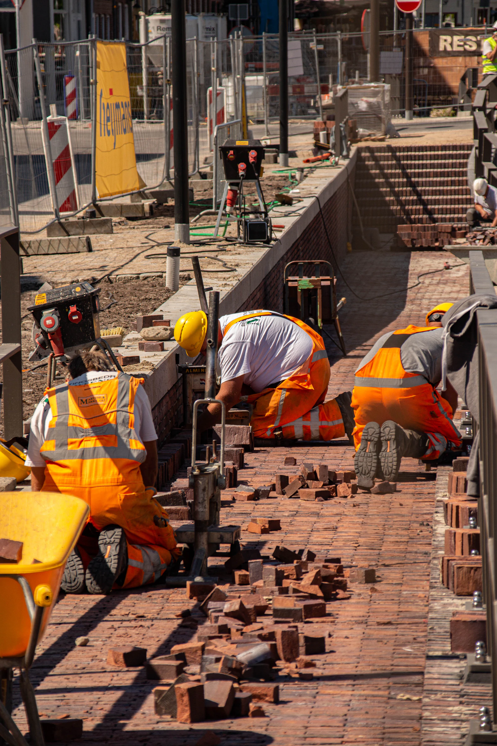 Civils crew installing a hard-surface finish on a completed utility project