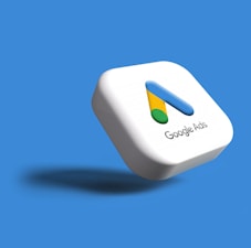 a white google logo on a blue background