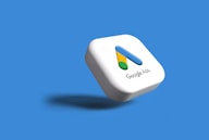 a white google logo on a blue background