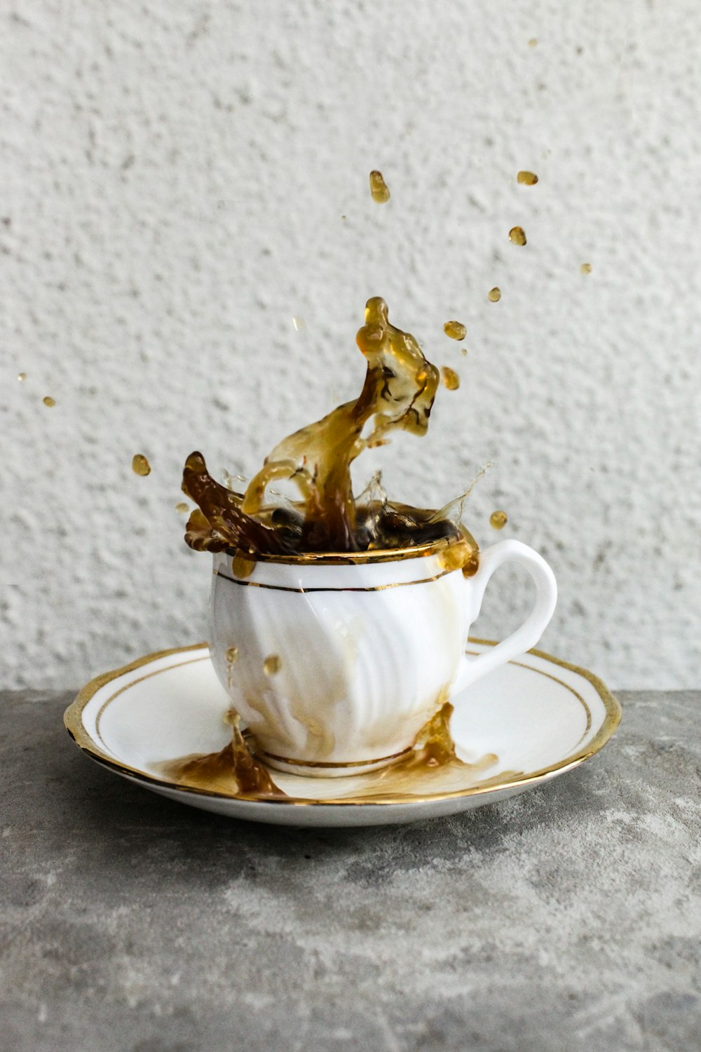 a cup of coffee with a horse on top of it