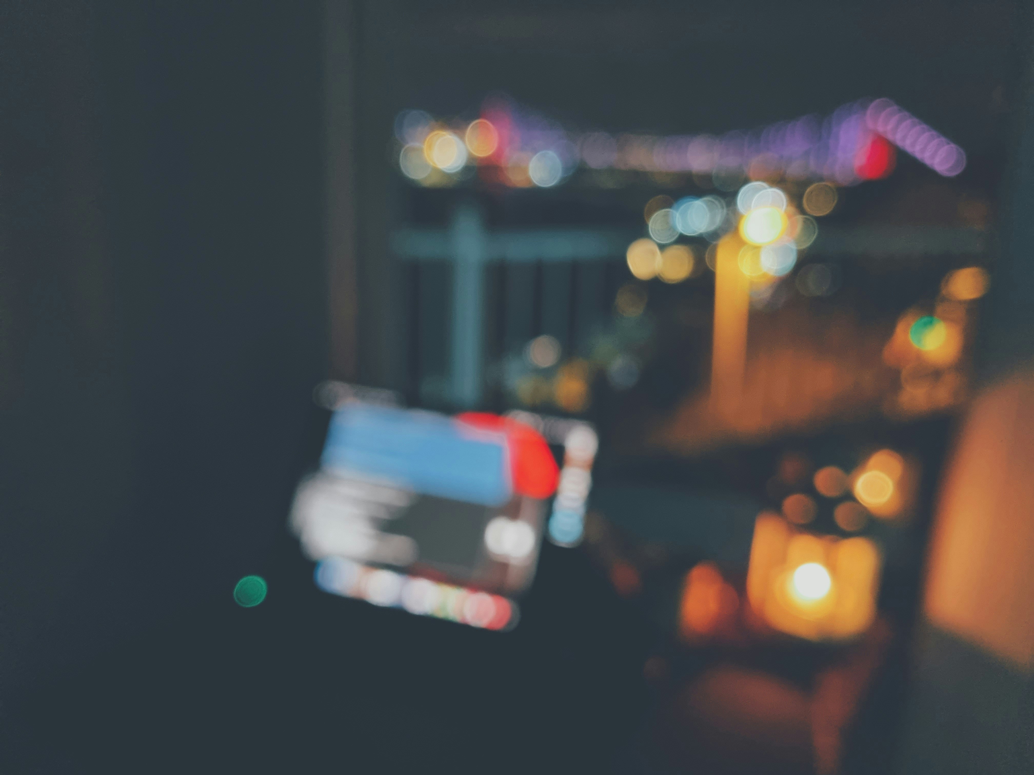 a blurry photo of a city at night