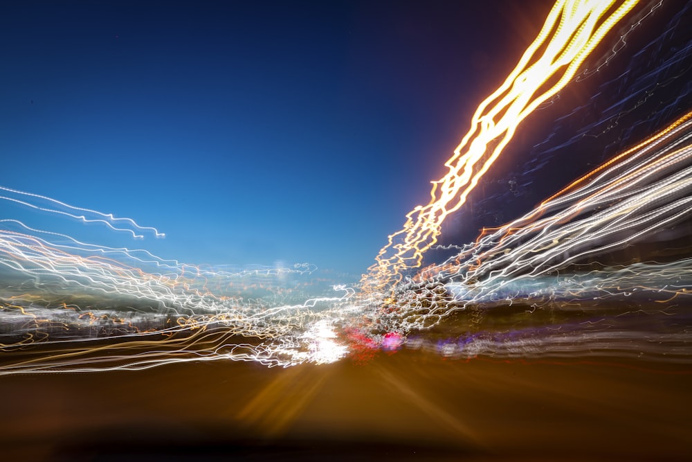 a blurry photo of a city street at night