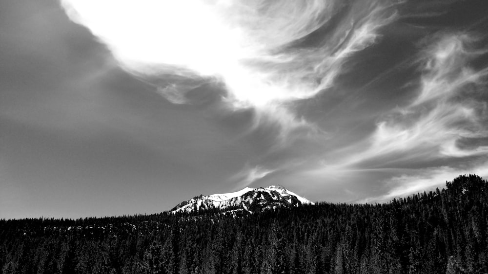 a black and white photo of a mountain