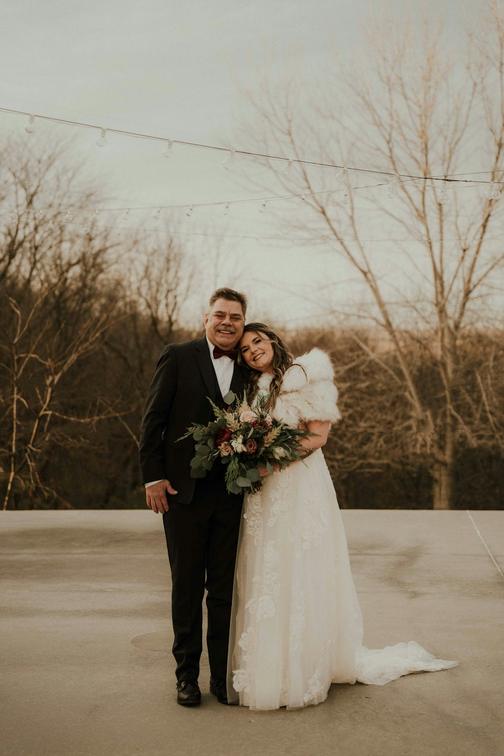 a man and a woman standing next to each other