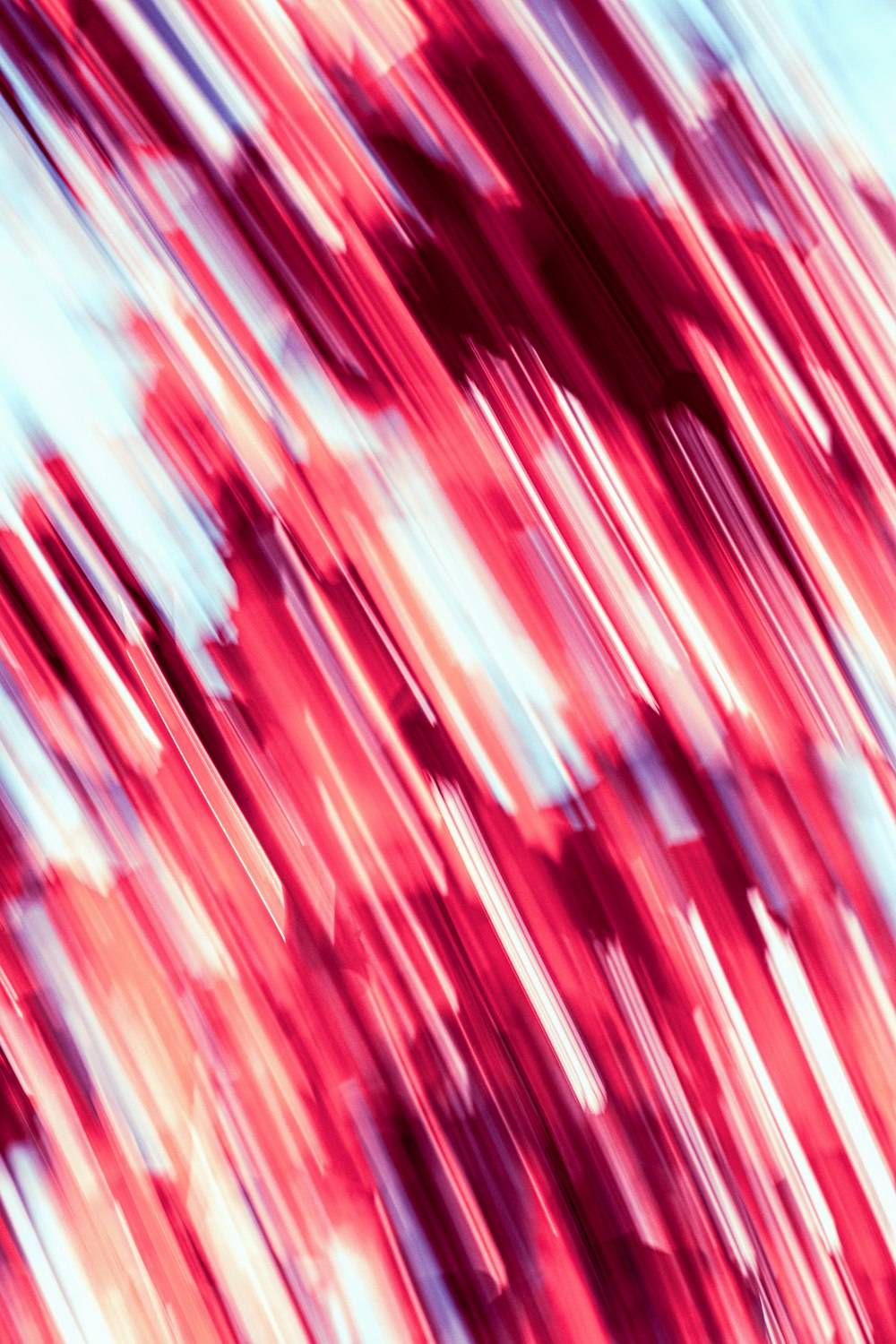 a blurry image of red and white lines