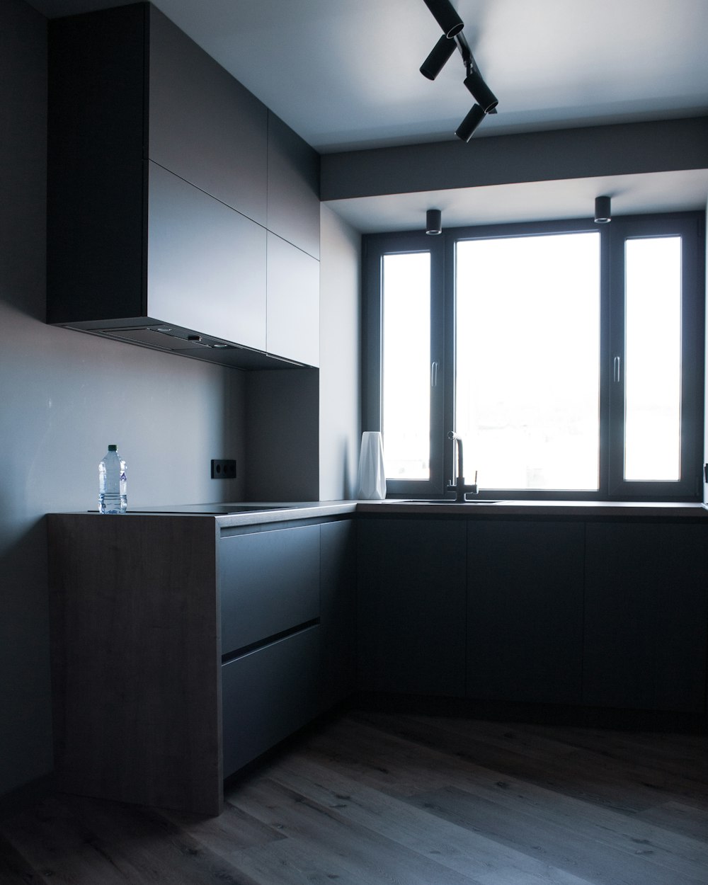 a kitchen with a window and a sink