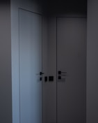 Modern minimalist interior showing multiple deli smartlocks installed on various doors