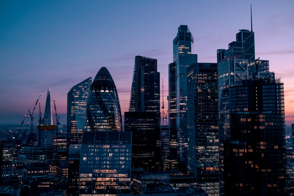a view of the city of london at dusk