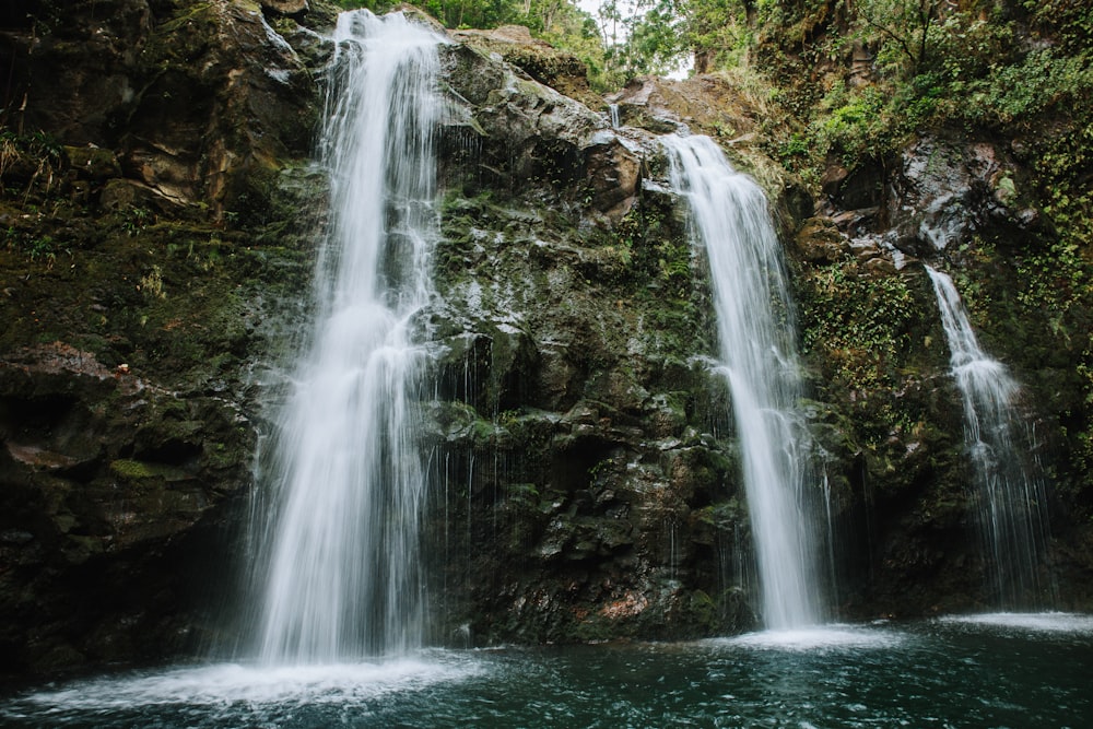 a large waterfall with lots of water coming out of it