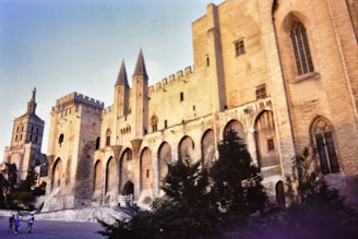 a large building with many windows and towers