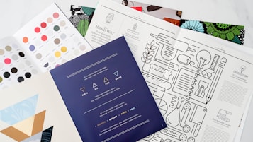 a bunch of papers that are on a table