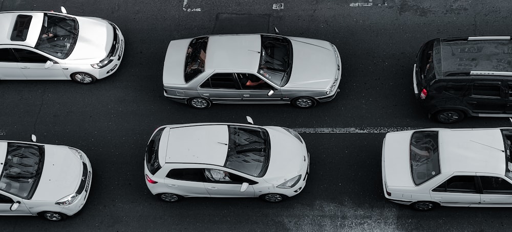 a group of cars parked in a parking lot