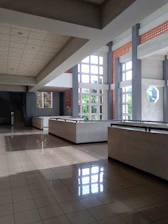 Interior of a spacious commercial unit with natural light and open floor plan.